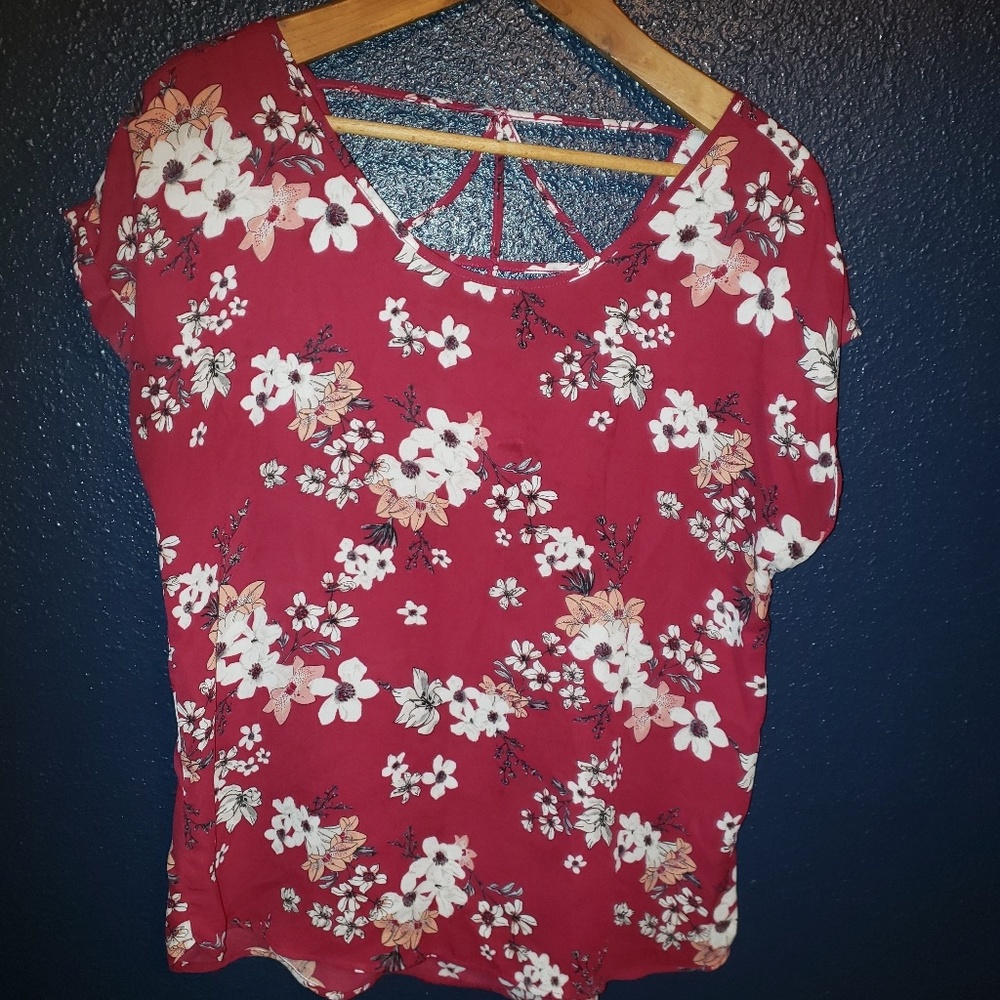 Red shirt with white flowers